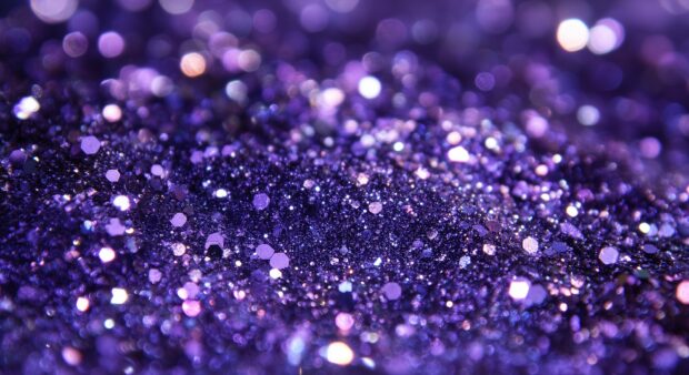 Purple glitter desktop background with a deep, rich sparkle.