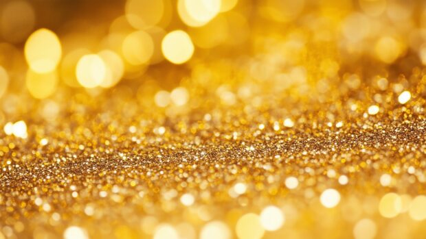 Rich golden glitter desktop background with a dazzling.