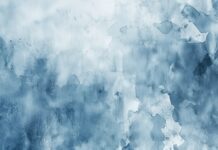 Soft light blue watercolor wallpaper for laptop with calming, serene tones.