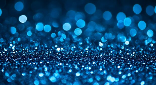 Sparkling blue glitter HD background with a cool.