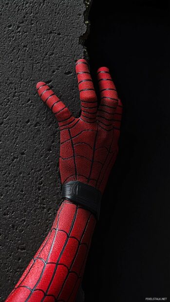 Spiderman hand gripping a wall with a solid black background.