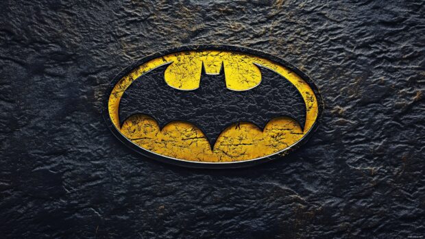 The classic Batman logo 4K in bright yellow and black.