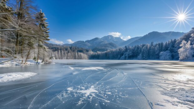 Winter landscape with a frozen lake and mountains.