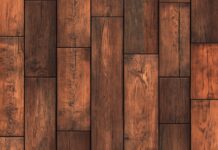 Wood desktop background QHD 2K with a seamless wooden plank floor pattern with natural wood tones.