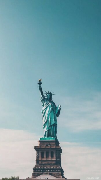 1080x1920 Wallpapers HD with a clean shot of the Statue of Liberty against a clear blue sky.