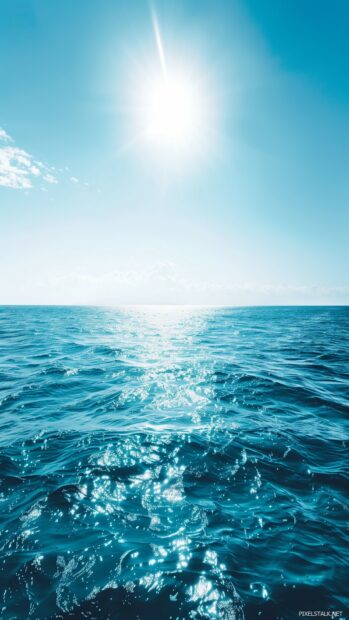 1080x1920 pixels Background of a vast ocean under a clear blue sky.