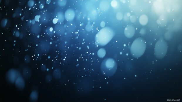 1920x1080 desktop wallpaper with Subtle raindrops falling against a blurred glass effect on a dark blue background.