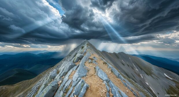 3D Nature with rocky mountain peak with dramatic clouds, sun breaking through, majestic view.