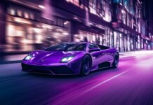 4K Car Wallpaper with a Lamborghini Murciélago in deep purple, captured speeding down a dark.