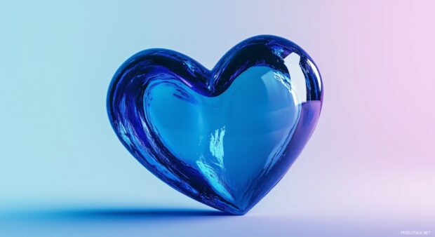 A close up of a shiny blue heart wallpaper.