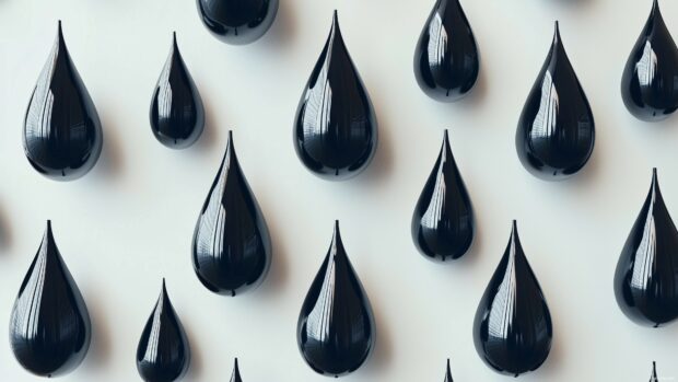 A collection of smooth, black 3D drops or teardrops gently suspended in a minimalist space, with soft shadows and reflections creating a modern, abstract look.