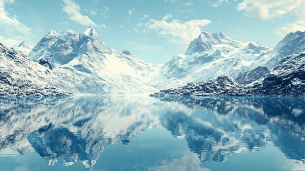 A cool alpine scene with snow dusted peaks and a serene glacial lake reflecting the mountains.