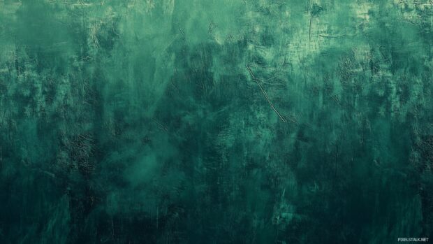 A dark green desktop wallpaper with a subtle, textured pattern that adds depth while maintaining a simple and clean design.