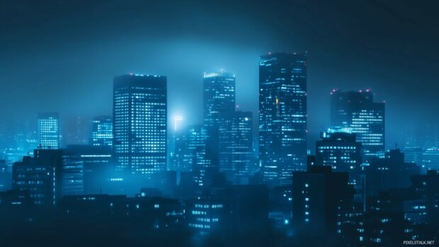 A foggy city night with skyscrapers partially obscured by mist, illuminated by soft glowing lights.