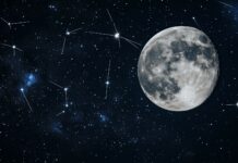 A full moon illuminating a clear night sky, with delicate constellations scattered around.