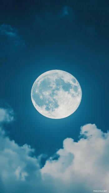 A full moon subtly illuminating a serene sky with faint, elegant cloud.