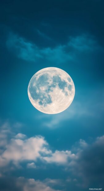 A full moon subtly illuminating a serene sky with faint, elegant clouds.