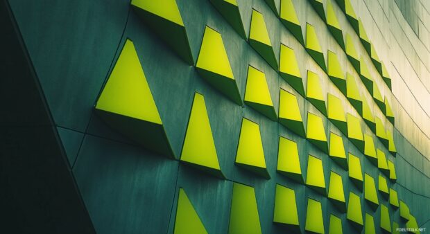 A geometric lime green background with alternating shades, creating depth and visual interest.