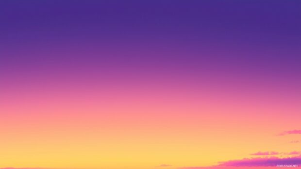 A gradient sunset sky fading from soft orange to deep purple, with smooth color transitions and no harsh details.