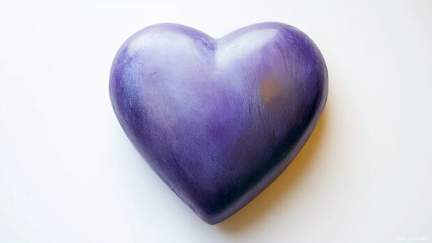 A large, solid purple heart centered on a soft white background.