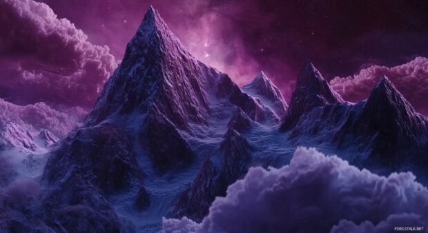 A majestic mountain HD wallpaper with sharp peaks under a vibrant starry night sky.