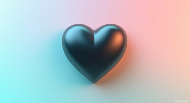 A matte black heart against a muted pastel background.