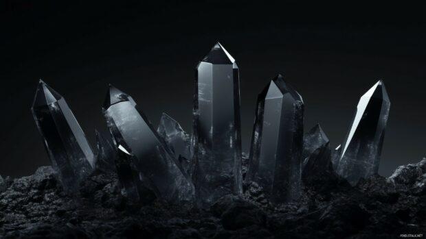 A minimalist 3D black crystal formation with sharp, clean edges, softly illuminated.