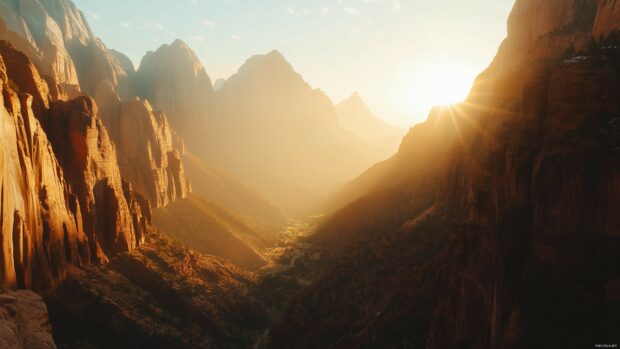 A panoramic view of the Rocky Mountains during sunrise, with golden light hitting jagged cliffs and valleys.