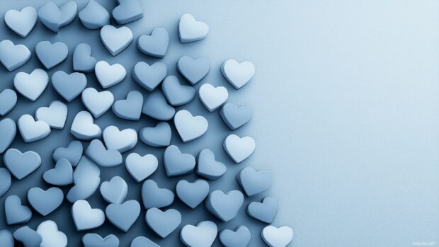 A pattern of small blue hearts in various shades.