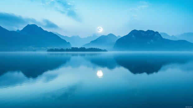 A serene landscape with a glowing full moon rising over a tranquil lake, surrounded by misty mountains and reflected in the water (2).