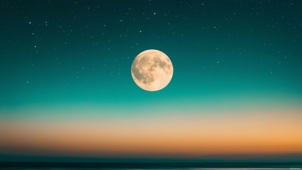 A serene landscape with a glowing full moon rising over a tranquil lake, surrounded by misty mountains and reflected in the water.