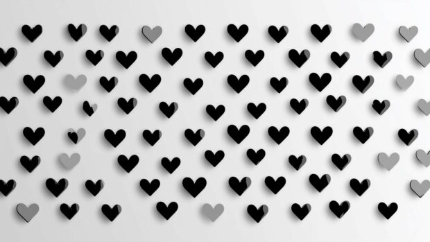 A simple pattern of small, outline style black hearts evenly spaced on a light gray background.