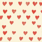 A simple pattern of small, red hearts 4K resolution evenly spaced on a light beige background.