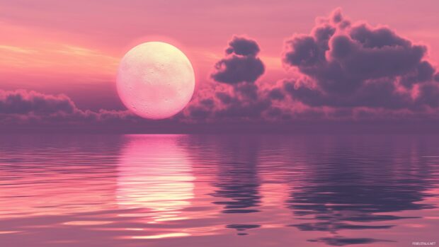 A stunning pink moon casting a soft glow over a calm ocean, with its reflection shimmering across the water.