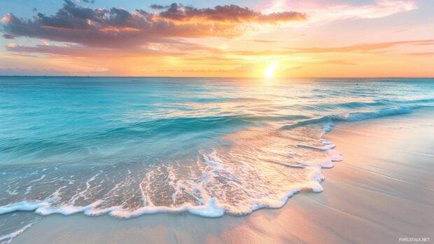 A tranquil beach Desktop wallpaper 1920x1080 with turquoise waters and a vibrant sunset .