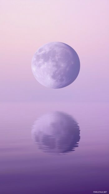 Aesthetic Moon Wallpaper with a purple moon against a clear, gradient night sky.