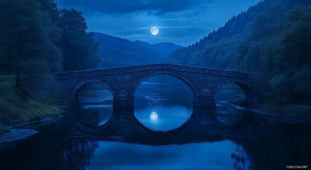 An ancient stone bridge crossing a river, bathed in gentle moonlight, with the silhouette of trees and hills in the background.