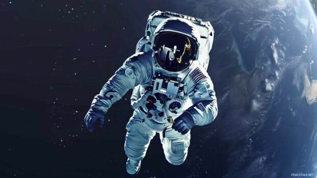 An astronaut floating in space with the Earth in the background, wallpaper 1920x1080.