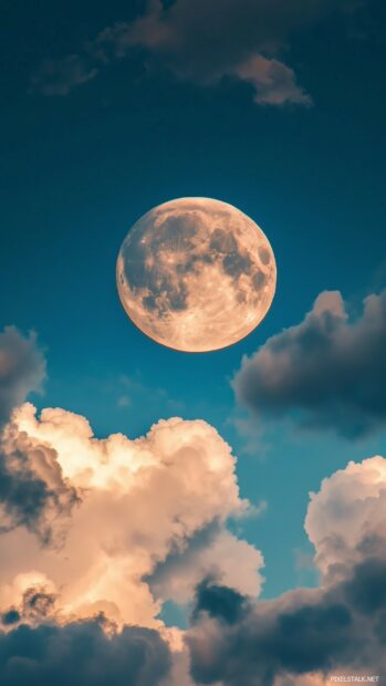 Beautiful Moon Wallpaper with a full moon subtly illuminating a serene sky with faint, elegant clouds.