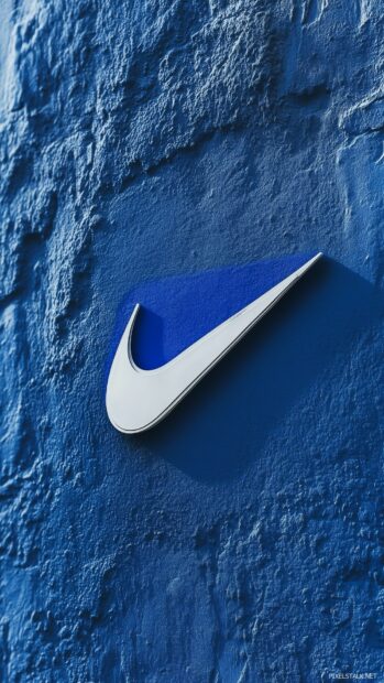 Blue Nike wallpaper featuring the iconic swoosh logo in a contrasting white, set against a textured blue background.