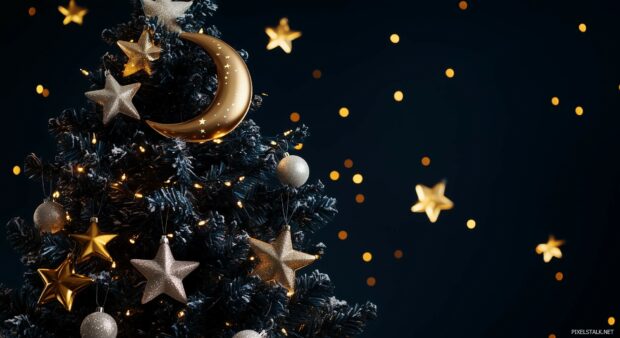 Christmas Tree Laptop wallpaper with a celestial theme, adorned with stars and moon ornaments.