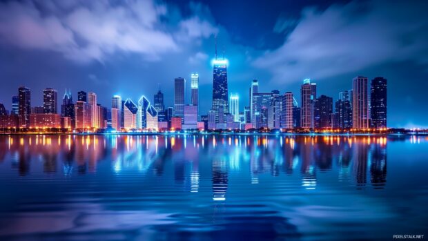 City skyline at night with cool twinkling lights and reflections, 1080p desktop background.