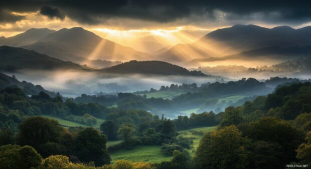 Dark, rugged mountains shrouded in mist under a dramatic stormy sky.