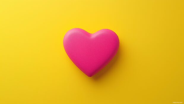 Flat 3D heart symbol in bright pink on a simple yellow background.