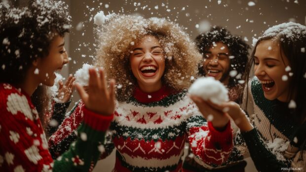 Funny Christmas Desktop Wallpaper with a funny Christmas party scene where a group of friends in silly holiday sweaters are having a snowball fight indoors.