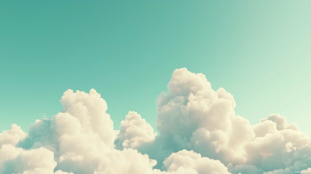 Gentle, abstract cloud formations in soft white on a light sky blue background.