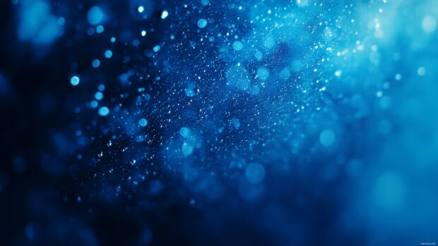 LaptopK Desktop Wallpaper with subtle raindrops falling against a blurred glass effect on a dark blue background.