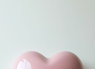 Large soft pink heart centered on a white background.