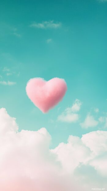 Love Wallpaper with pastel pink heart floating on a plain sky blue background.