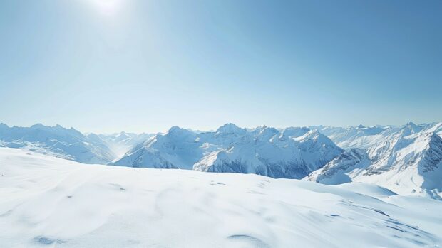 Majestic winter mountains under a clear sky.